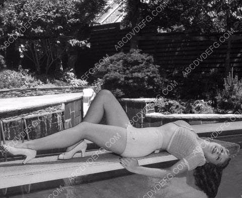 slender Evelyn Ankers in short shorts on diving board in back yard 8b20-0233