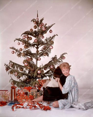 Laurel Goodwin enjoys new fur coat Christmas morning 8b20-0367