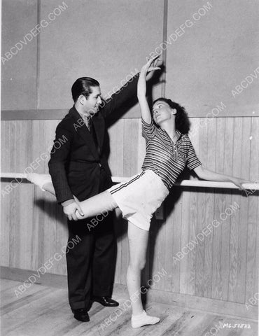 candid Maureen O'Sullivan practices some dance moves MGM Studios 8b20-0471