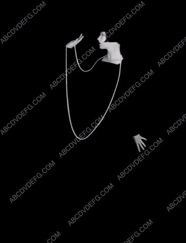 pearl necklace against black backdrop Louise Brooks portrait 8b20-0799