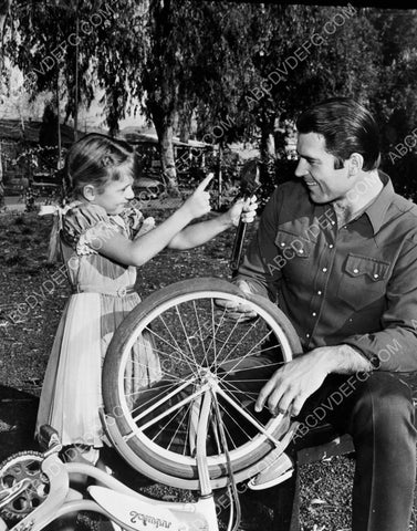 Clint Walker fixes his daughters bicycle 8b20-10691