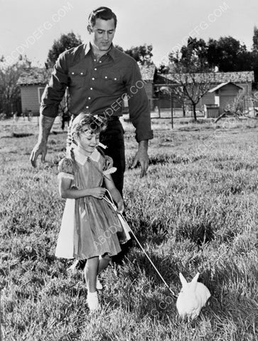 Clint Walker and daughter take her rabbit for a walk 8b20-10700