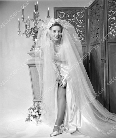 beautiful Colleen Townsend adjusts her bridal gown garter 8b20-10831