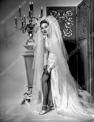 beautiful Colleen Townsend adjusts her bridal gown garter 8b20-10837