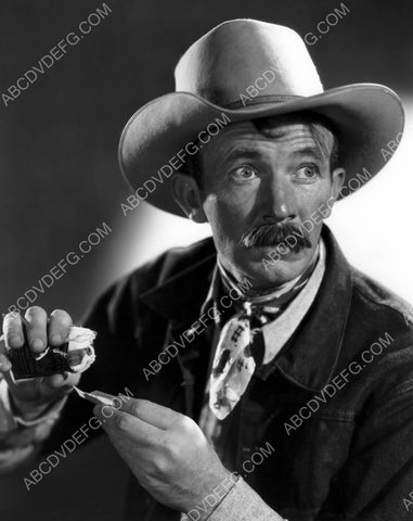 Walter Brennan rolling a cigarette film The Cowboy and the Lady 8b20-11077