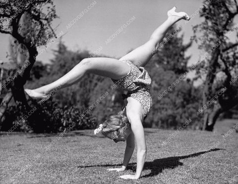 Dorothy Andre does her contortionist exercises in backyard 8b20-11894