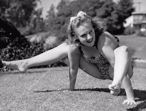 Dorothy Andre does her contortionist exercises in backyard 8b20-11895