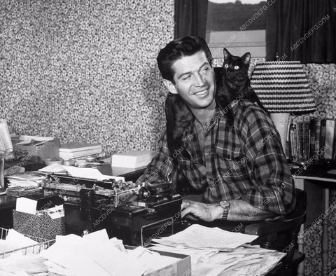 cool George Nader banging away at typewriter under cat supervision 8b20-12071