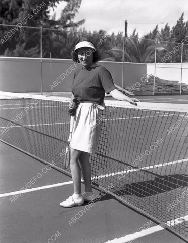 athletic Gloria Swanson on the tennis court 8b20-12381