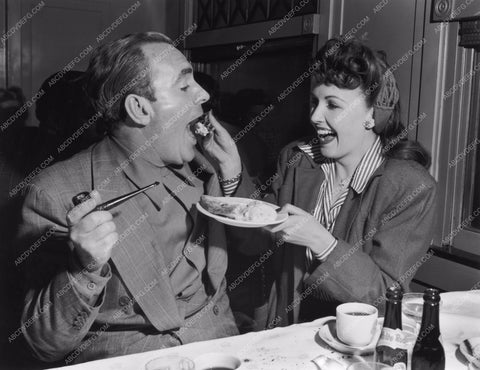 Pat O'Brien Frances Gifford having fun w pie in studio commissary 8b20-12613