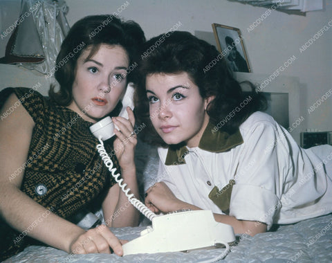 Annette Funicello and friend talk on telephone 8b20-13017