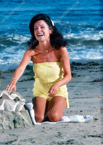 Annette Funicello playing in the sand at the beach 8b20-13052