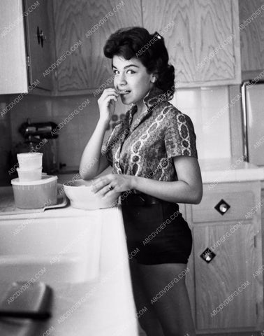 cute Annette Funicello eating some crackers in the kitchen 8b20-13068