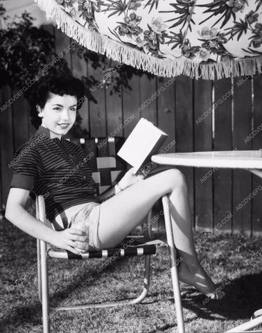 Annette Funicello cute in shorts reading book in backyard 8b20-13087