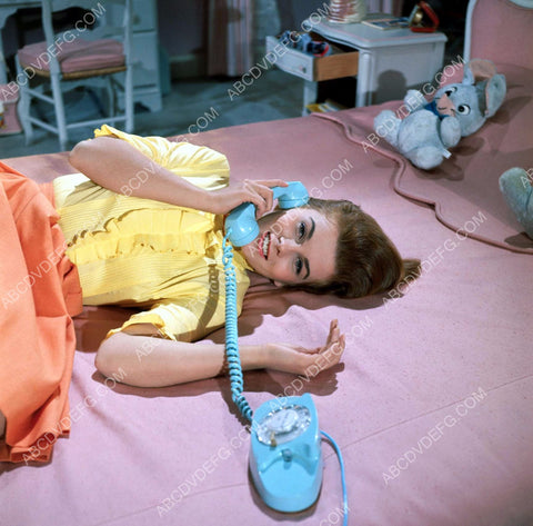 Ann-Margret on the telephone laying on bed 8b20-13337