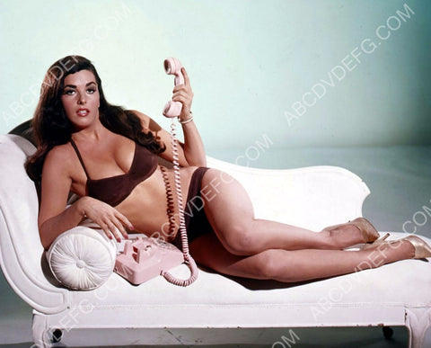 sexy Edy Williams laying on chaise lounge on telephone 8b20-13651