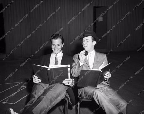 Pat Boone maybe Bobby Darin going over notes 8b20-13785