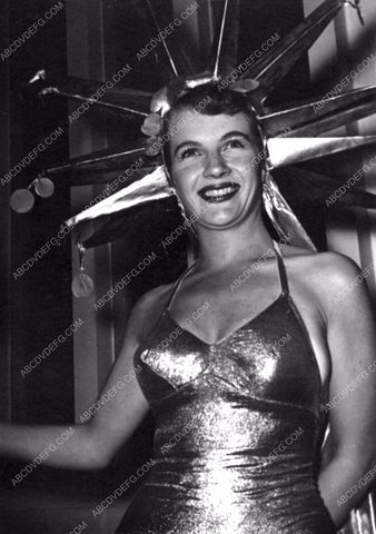 Corinne Calvet in Statue of Liberty costume 8b20-13982