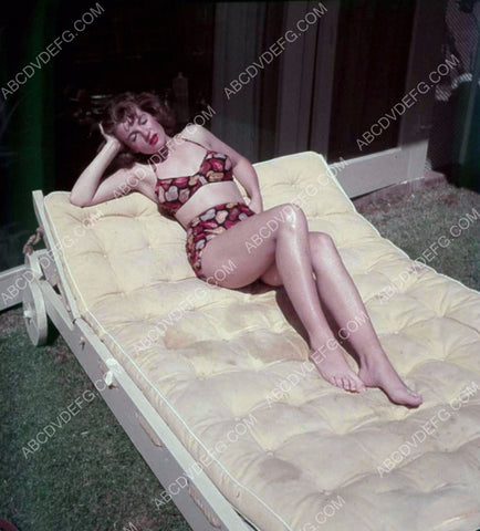 Corinne Calvet napping and sunbathing in the backyard 8b20-13989