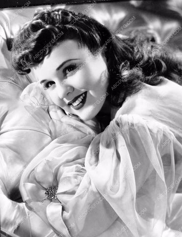 beautiful Deanna Durbin laying on the bed 8b20-14328