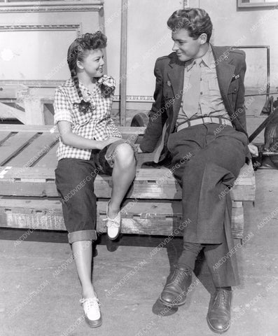 candid Guy Madison and co-star on studio backlot 8b20-14419