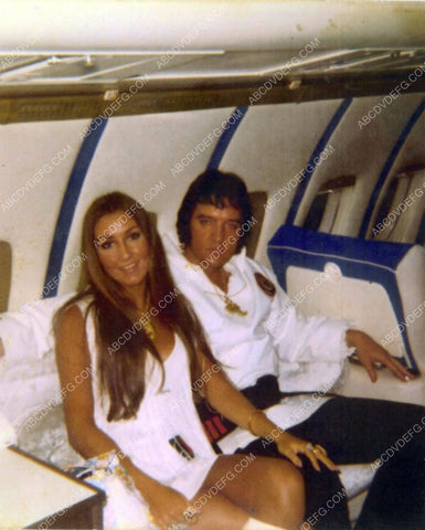 Priscilla & Elvis Presley fly on private jet 8b20-14573