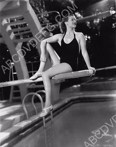 gorgeous Simone Simon in swimsuit sitting on the diving board 8b20-14942