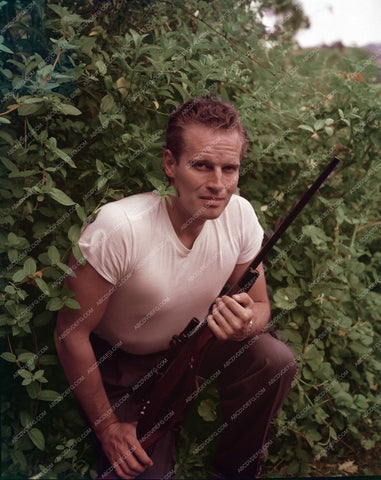 Charlton Heston and his hunting rifle 8b20-15006