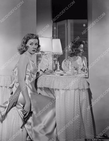 sexy Gloria Grahame sitting at her makeup table with a Luger pistol 8b20-15038