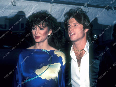 Victoria Principal Andy Gibb arrive at some event 8b20-15601