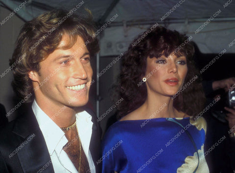 Victoria Principal Andy Gibb arrive at some event 8b20-15604