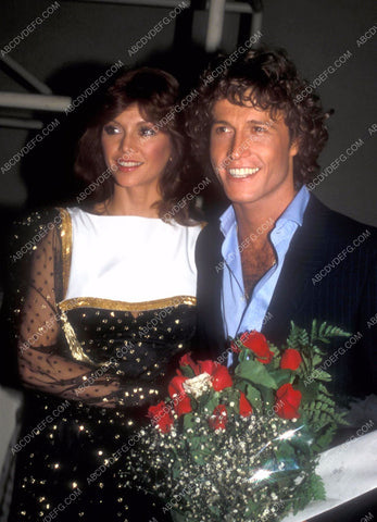 Victoria Principal Andy Gibb arrive at some event 8b20-15605