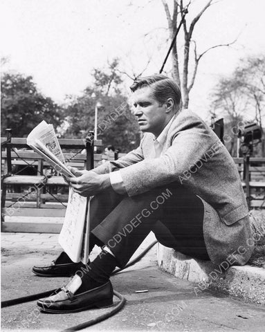 George Peppard reading the newspaper behind the scenes 8b20-15693