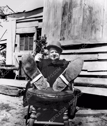 W.C. Fields giving his feet a rest 8b20-16057