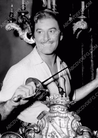 great candid Errol Flynn w his sword on set film Master of Ballantrae 8b20-16154