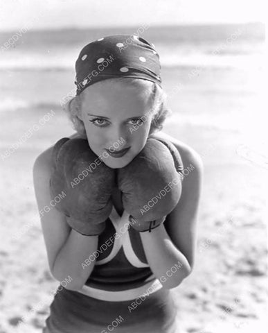 Bette Davis don the boxing gloves for a workout on the beach 8b20-16231