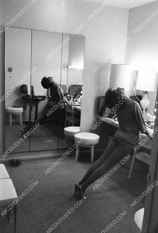candid Cyd Charisse stretching in her dressing room 8b20-17006