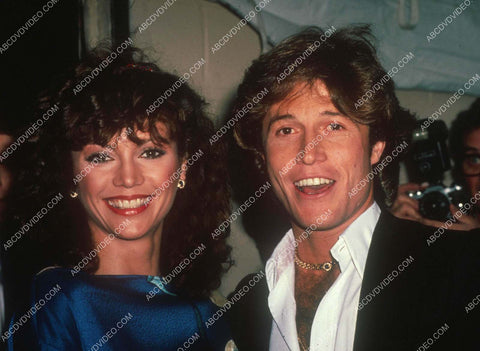 Victoria Principal Andy Gibb out for the evening swarmed by the press 8b20-17032