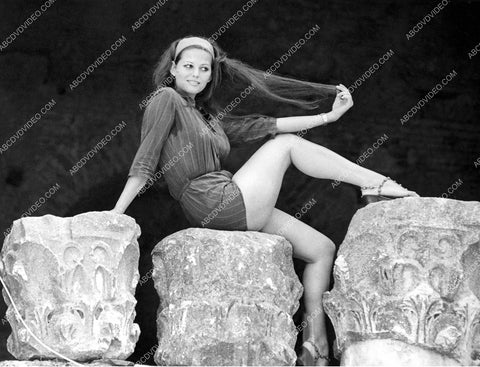 Claudia Cardinale sitting among the ruins in Rome 8b20-17187