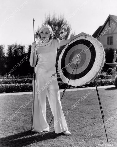 archery expert Adrienne Ames practices in the back yard 8b20-1721