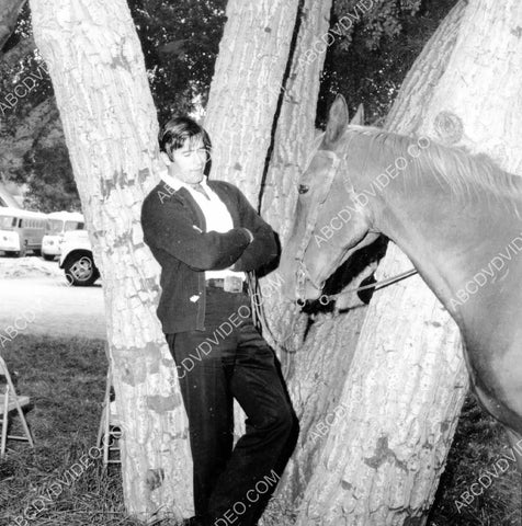 Clint Walker spends a little time w his horse on location TV Cheyenne 8b20-17226