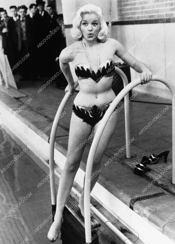 shapely Diana Dors sticks her toes in the water 8b20-17311