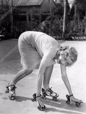 Adrienne Dore playing around on roller skates 8b20-1741