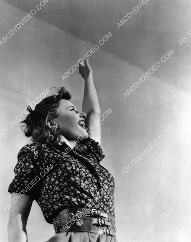 Barbara Stanwyck waving to the sky 8b20-17440