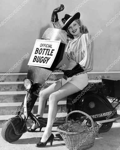 sexy Dolores Moran on the Bottle Buggy recycle motor scooter 8b20-17532