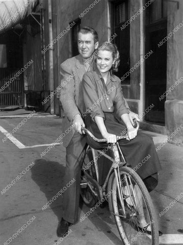 James Stewart Grace Kelly go for bicycle ride on studio backlot 8b20-17631