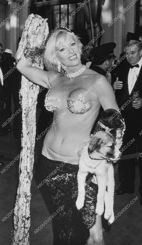 sexpot Edy Williams w her dogs and wearing flower pasties 8b20-17692