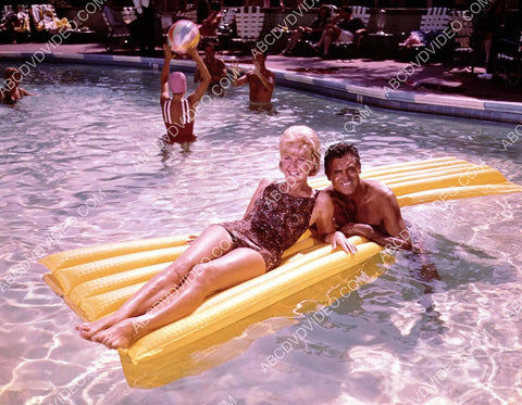 Doris Day and Cary Grant enjoy some time in the swimming pool 8b20-18188