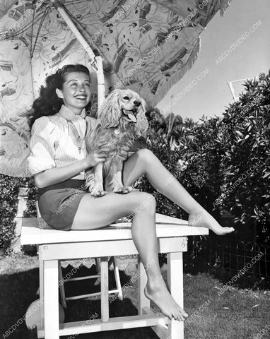 beautiful Gail Russell out in the sun w her dog 8b20-18400