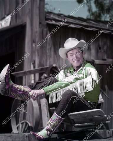 Roy Rogers putting his boots on 8b20-18973